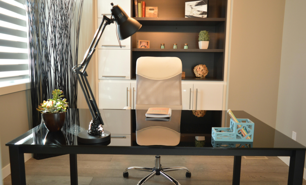 used office chair and table in a furnished room